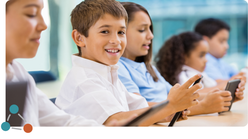 Pupils holding a smartphone in their hands
