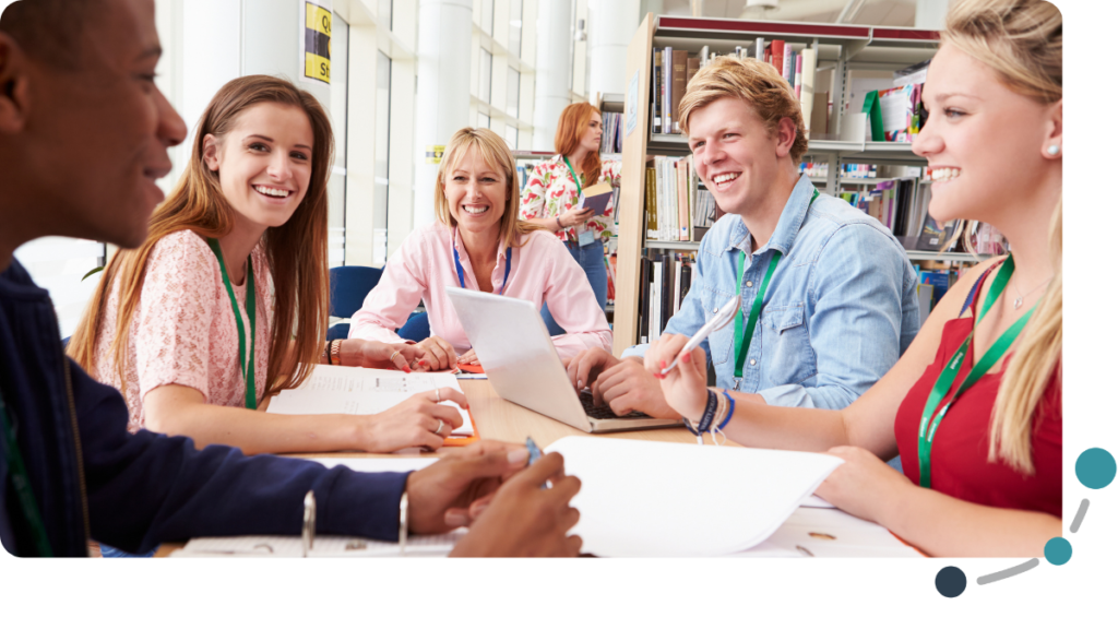 Adults sitting on a table